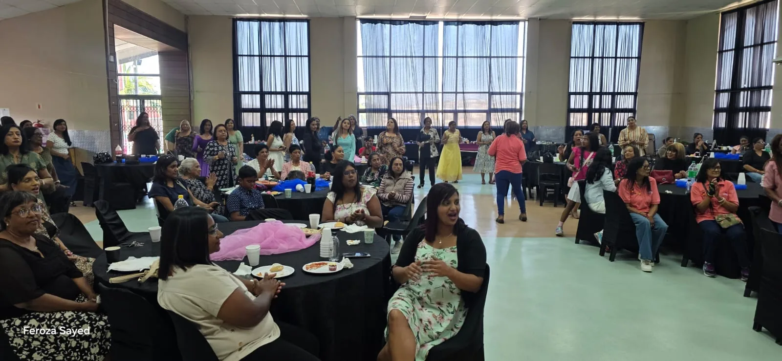 A community event with families seated together