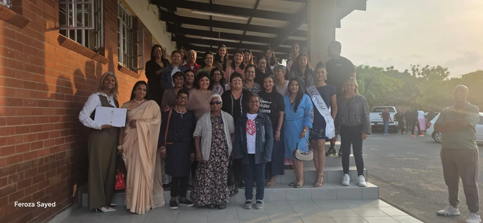 A group gathered together after a community programme